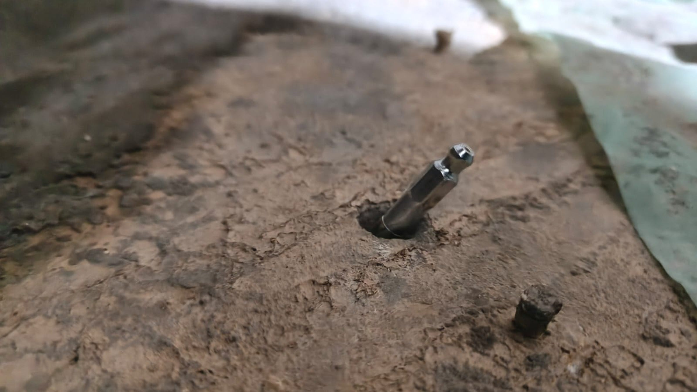 S-10 stainless steel injection packer inserted perfectly into concrete crack